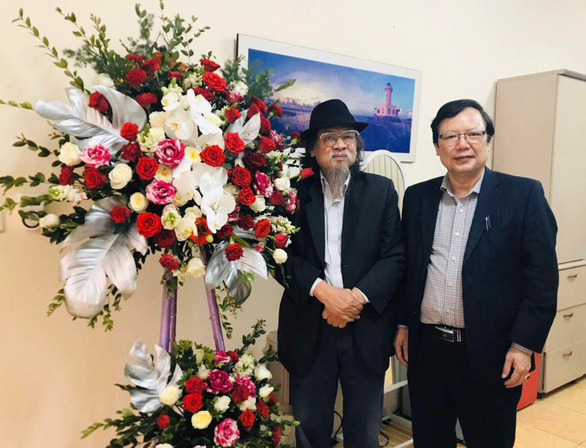 Phó TBT Báo Xây dựng Tào Khánh Hưng ( bên phải) và Nhà báo Lê Quang Vinh.
